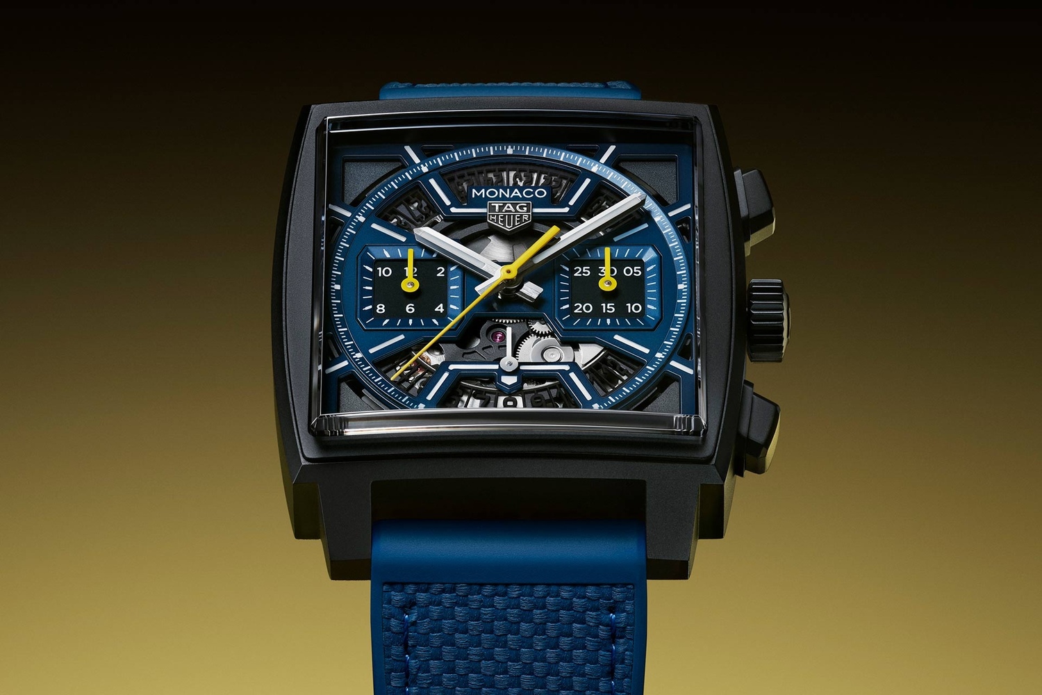 TAG Heuer Monaco镂空计时腕表–深蓝款 黑色DLC钛金属表壳，表径39毫米，时、分、小秒针、日期、计时，Calibre TH20-00自动上链机芯，动力储存80小时，蓝宝石水晶玻璃镜面及底盖，防水100米，压印小牛皮内衬橡胶表带。
